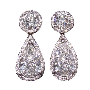 Elegant GIA Certified Round and Pear Shape Dangle Earrings