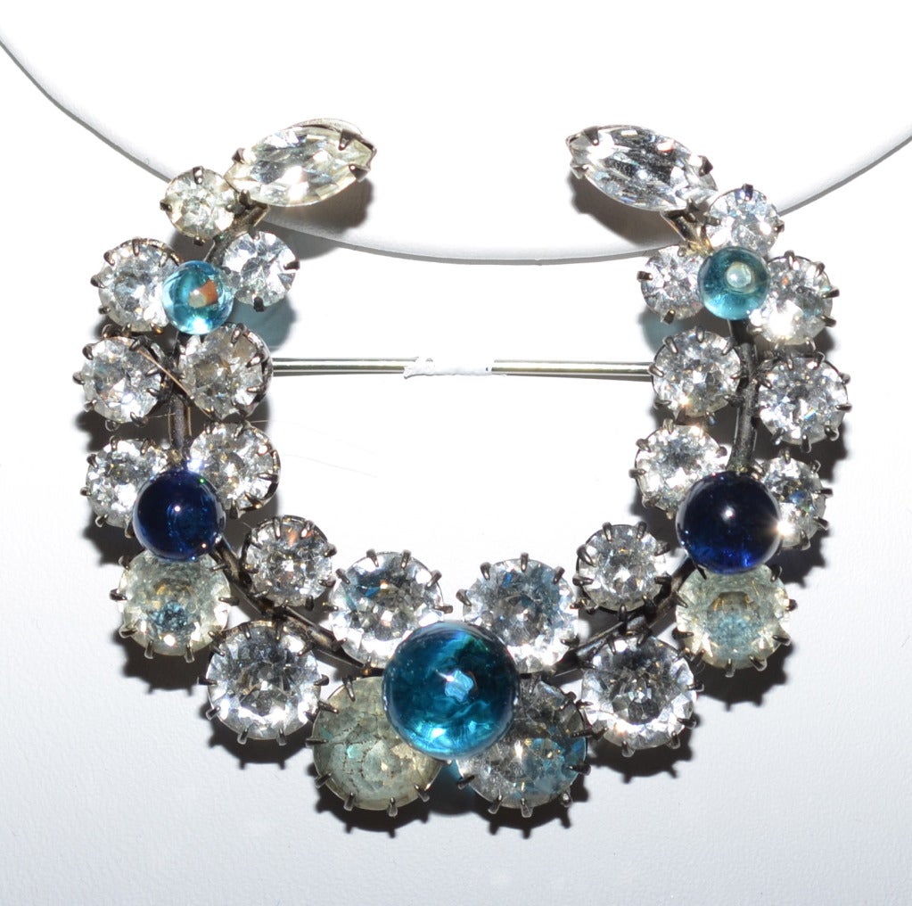 Rare set from the 1950's. Gorgeous Christian Dior rhinestone and glass demi-parure. Silver toned metal, clear individual set rhinestones topped with blue glass balls. The brooch measures 2