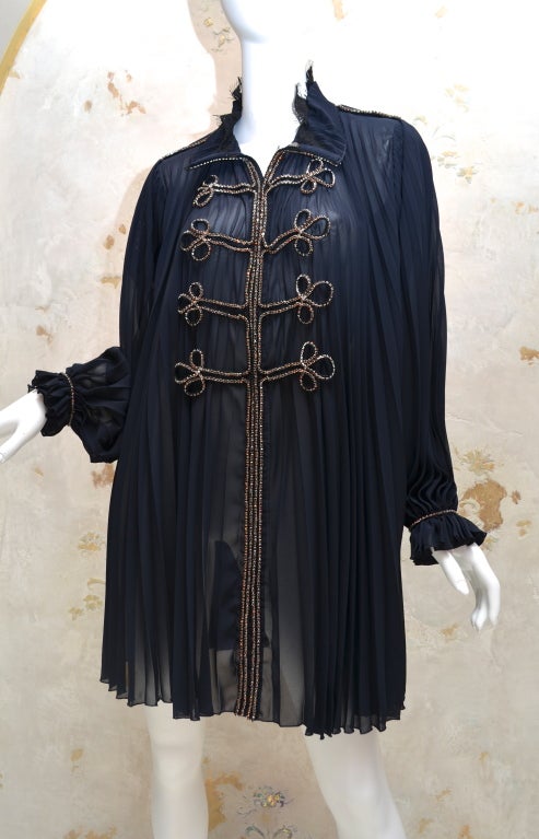 Jun Takahashi for Undercover, 2007 Purple collection, deep navy blue sheer pleated caftan mini dress with front hook closure. Military style amber colored rhinestone crystal detailing at front center, shoulder and sleeve cuffs. Black lace under