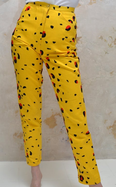 Vintage Stephen Sprouse high waisted tapered leg day glo leopard print jeans. Bright taxi cab yellow with red and black spots. Labeled a size 4. 

Excellent Condition