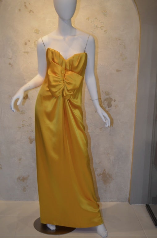 Yves Saint Laurent Haute Couture Strapless Satin Evening Gown from the 1980's. Patron Original, numbered label. Exquisite quality, intricate couture construction. Built in bodice of same fabric with separate side zipper. Hand Stitched zipper and