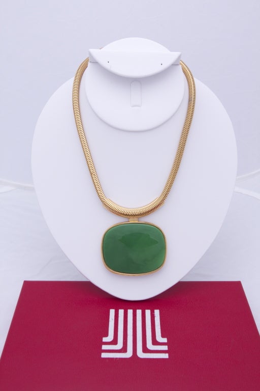 Lanvin vintage gold tone metal necklace with 3 interchangeable plastic pendants. In original red box with white JL Jeanne Lanvin logo on the top of box and Bijoux Lanvin signed satin lining. Green, marbled red, and black pendants. Chain measures 17