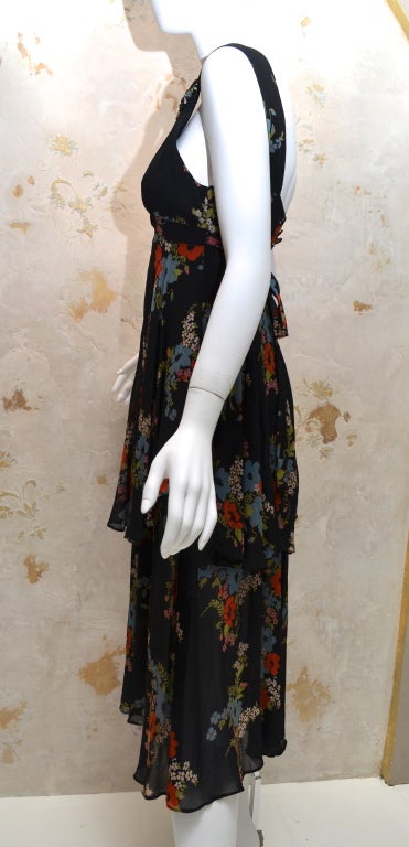 Original swinging London Ossie Clark for Radley, vintage floral print boho crepe dress from the 1970's. XS, Small size. Black background, red, blue green & white floral print. Low back, does not fully button on my mannequin. Size reads 10 or 34