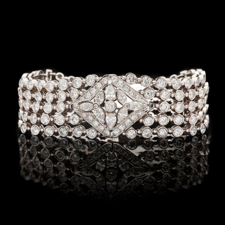 Estate 18.4 carat total weight Diamond Bracelet features 143 Mixed Cut Diamonds set in 18Kt White Gold.  Bracelet measures 7
