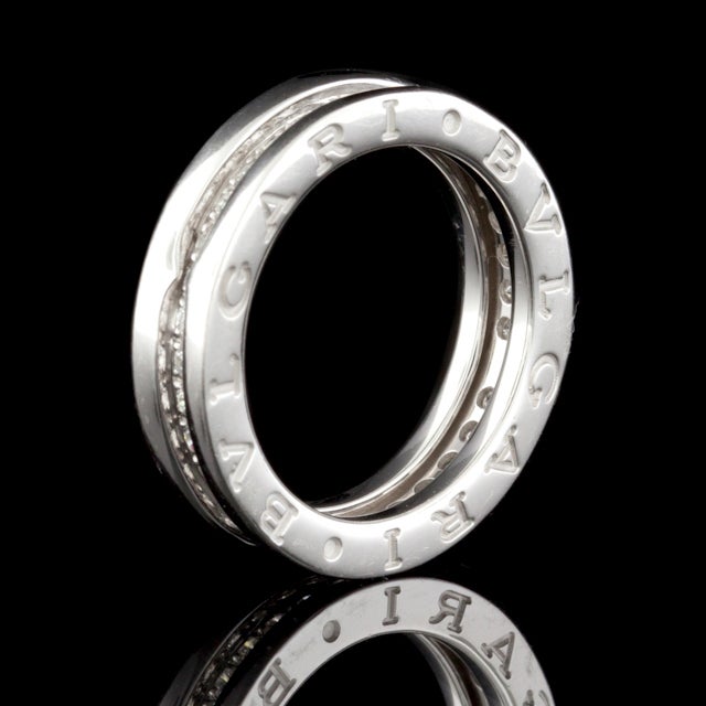 Bulgari B.Zero1 18Kt White Gold Diamond band ring that consists of 32 Round Cut Diamonds with a total approximate weight of 0.64cts.  Ring is 5mm wide, weighs 7.1 grams, and is a size 51 or US 5.75.