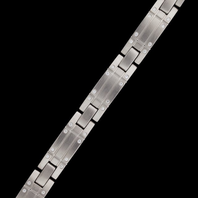 Tiffany & Co. Streamerica 18Kt White Gold Diamond Link Bracelet with 56 Round Brilliant Cut Diamonds with F-G color range, VVS clarity range for a total approximate weight of 0.56cts. Bracelet measures 8