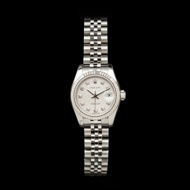 Rolex stainless steel Lady Datejust wristwatch with diamond indexes to the dial. It has a 26mm case, and 6.25