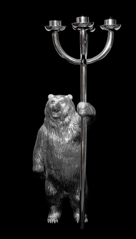 Each candelabrum is superbly modeled, hand made in heavy cast silver and then the surface is finely chased to the highest standard by master craftsmen. Each bear is made of solid sterling silver and weighs nearly 120ozs. That is a lot of silver. You