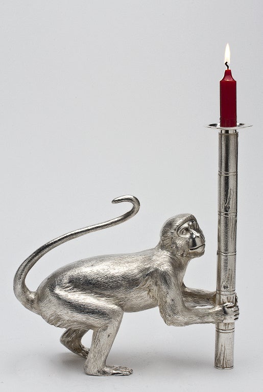 Each candlestick is accurately modeled, hand made and chased to the highest standard. Each monkey is made of sterling silver and weighs nearly 90ozs. Each monkey strikes a different pose and carries a candleholder in the shape of a realistic silver