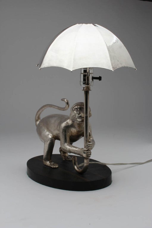 monkey holding lamp shade