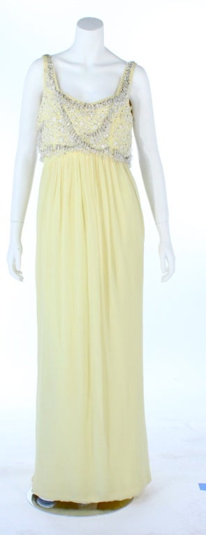 Ceil Chapman gown in pale yellow silk chiffon with crystal beaded fringe.