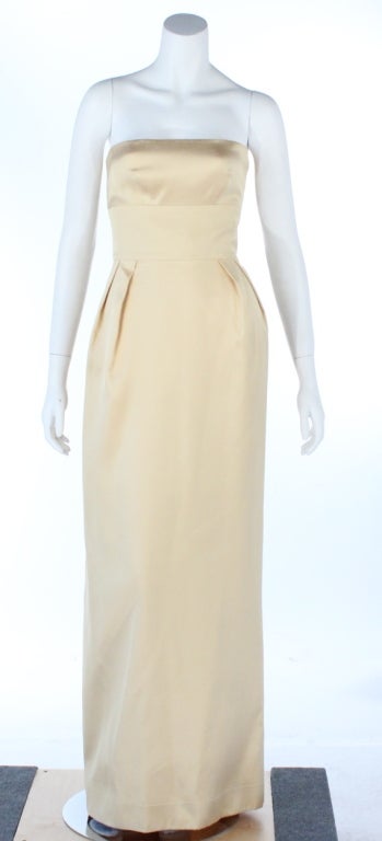 Elegant Jeanne Lanvin light yellow strapless silk gown.
Fitted bodice. XS/0
Bust: 32