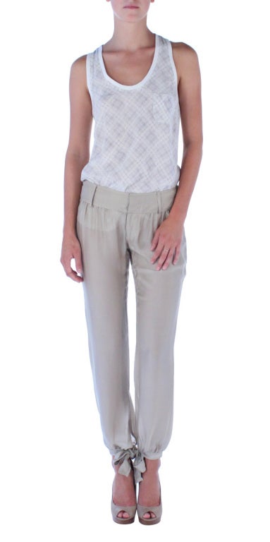 Khaki silk pants with adorable ties at the ankle.  Gucci under Tom Ford has a wonderful femininity in every piece.