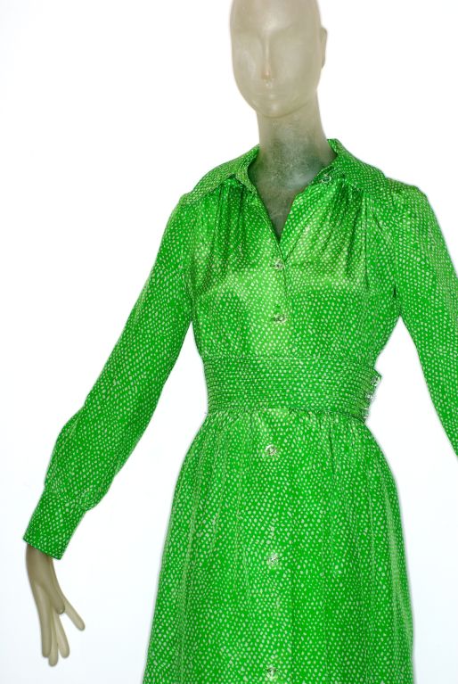 Beautifully crafted and joyfully colored Galanos dress in lime with cream spots.  Buttons are translucent and the pin stitched waist is fitted.  The dress is lined in a thin, light silk organza.  Perfect day to cocktail dress!