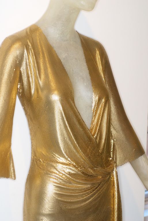 Extraordinary Gianni Versace metal mesh oroton toga style dress.  A similar dress is in the Collection of the Costume Institute at the Metropolitan Museum of Art.<br />
<br />
Gianni Versace celebrated rock and roll, flashiness and the nouveaux