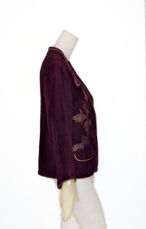 Amazing circa 1971 suede plum colored Roberto Cavalli suede jacket with appliques of leaves and flowers.  Leather piping in gold and bronze.  An incredible piece!<br />
<br />
RARE vintage<br />
24 West 57th Street<br />
in The New York Gallery