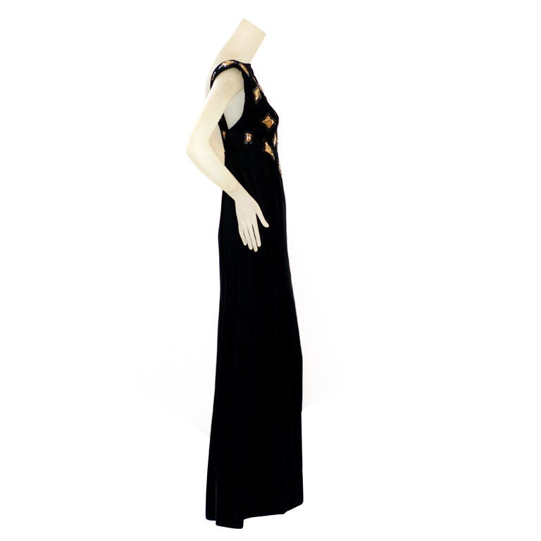 A beautiful and elegant haute couture gown from Hubert de Givenchy.  The style is classic Audrey Hepburn who famously was muse to Givenchy.   <br />
<br />
The gown is from the garde robe of a well known haute couture client.  The black silk