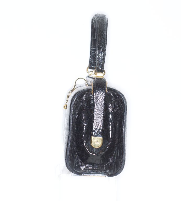 Beautifully crafted Fernande Desgranges black Crocodile handbag.<br />
<br />
RARE vintage <br />
STORE HOURS: Monday - Friday 11:30AM to 6PM<br />
Weekend Appointments Available<br />
24 West 57th Street<br />
in The New York Gallery