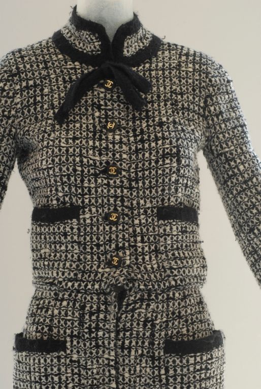 Chanel haute couture tweed dress with matching scarf (scarf is not photographed). It was featured in the 1978 ad campaign and is right on trend for the seventies-inspired looks. <br />
<br />
The tweed dress is one of Coco Chanel's classic