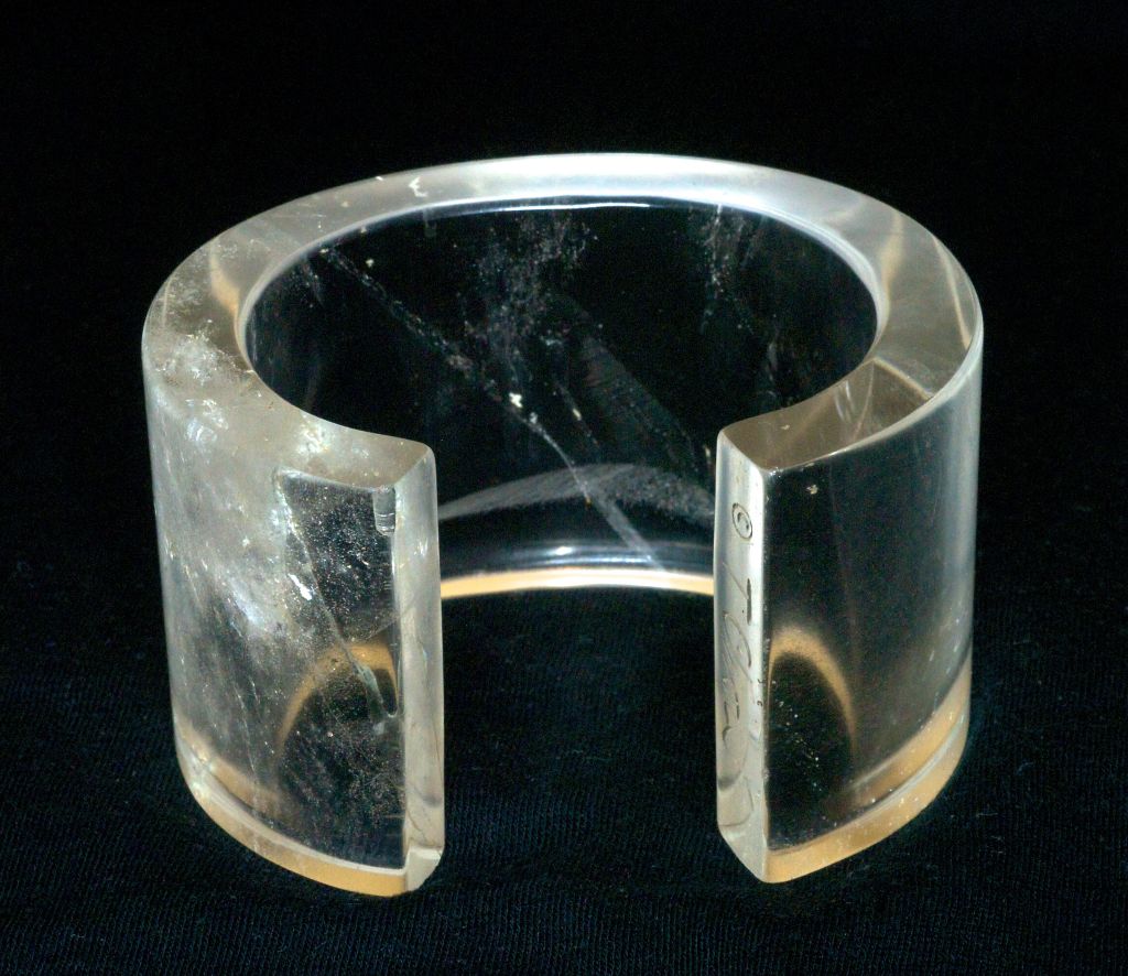 An extraordinary and iconic Tina Chow rock crystal cuff.  The cuff is cut from a single piece of rock crystal and is signed Tina Chow.  Tina was photographed wearing a similar cuff with the bamboo Kyoto bracelet.<br />
<br />
Cuff opening: 1