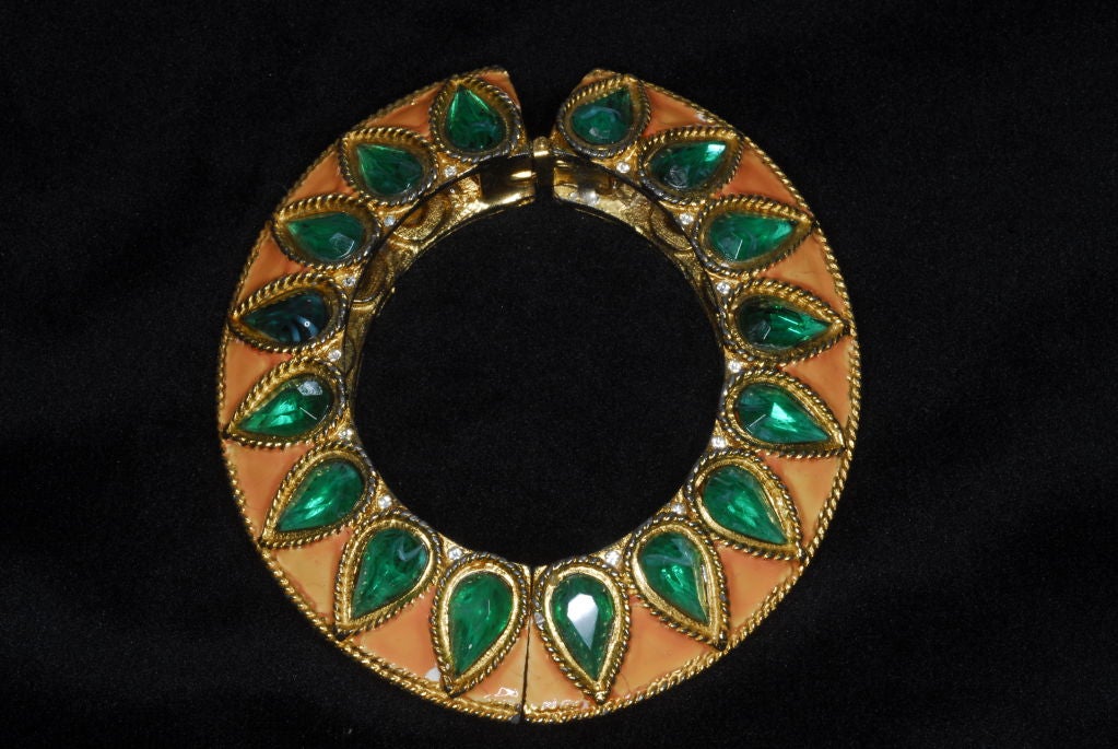 Circa 1960s Kenneth Jay Lane Mughal-style bracelet in an apricot enamel with green glass stones.  <br />
<br />
RARE vintage<br />
Store Hours: Monday to Friday 11:30 to 6PM<br />
24 West 57th Street<br />
Fifth Floor<br />
212.581.7273<br