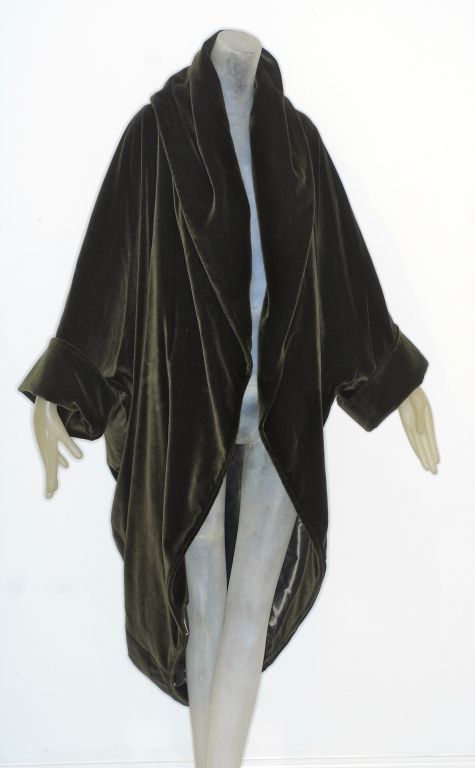 Dramatic and romantic Romeo Gigli moss green velvet cocoon coat.  Coat has a large soft draped collar, kimono style sleeves and can be worn open or wrapped.<br />
<br />
This is a part of a large Romeo Gigli collection that we have, if you are