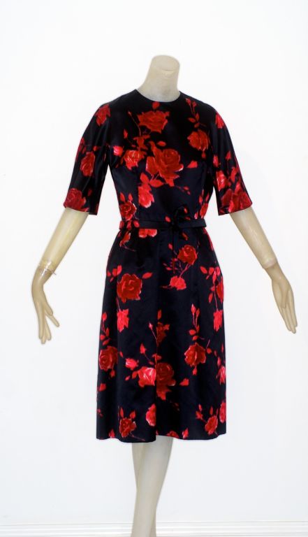 A lush black silk dress from the early 1960s by Harvey Berin with a deep red rose print.  <br />
<br />
RARE vintage<br />
Store Hours: Monday to Friday 11:30 to 6PM<br />
24 West 57th Street<br />
Fifth Floor<br />
212.581.7273<br />
Follow