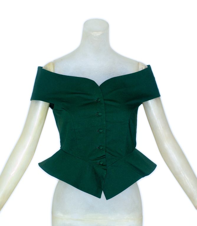 A late 1980s Romeo Gigli forest green fitted top.<br />
<br />
RARE vintage<br />
STORE HOURS: Monday to Friday 11:30 to 6PM<br />
Weekends by appointment.  <br />
24 West 57th Street<br />
Fifth floor<br />
212.581.7273<br />
Follow our