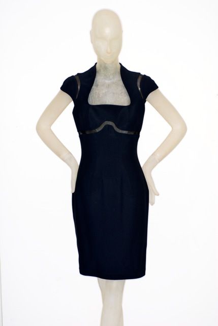 Thierry Mugler's dresses were always a dream fit and sophisticated/sexy.  This dress has shoulders and a waist defined by a transparent wavy cut-out.  Dress was never worn.<br />
<br />
RARE vintage<br />
STORE HOURS: Monday to Friday 11:30 to