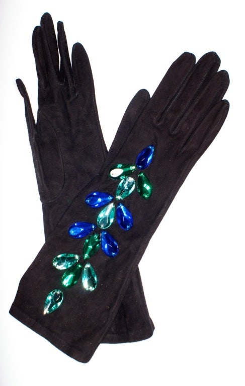 Gorgeous black suede Yves Saint Laurent rive gauche gloves with large blue, emerald and aqua stones.<br />
<br />
Size 6 1/2<br />
Stamped Yves Saint Laurent rive gauche on the interior<br />
<br />
RARE vintage<br />
STORE HOURS: Monday to