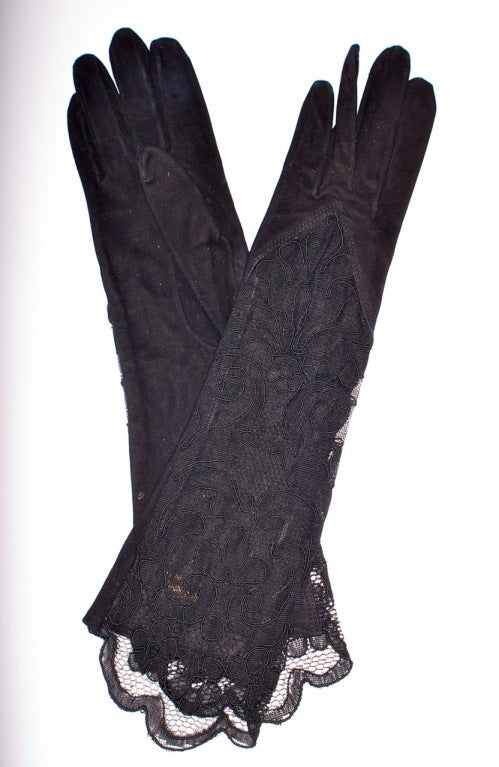 Beautiful black suede and sheer black lace Yves Saint Laurent rive gauche gloves.<br />
<br />
<br />
RARE vintage<br />
STORE HOURS: Monday to Friday 11:30 to 6PM<br />
24 West 57th Street<br />
Fifth floor<br />
in The New York Gallery