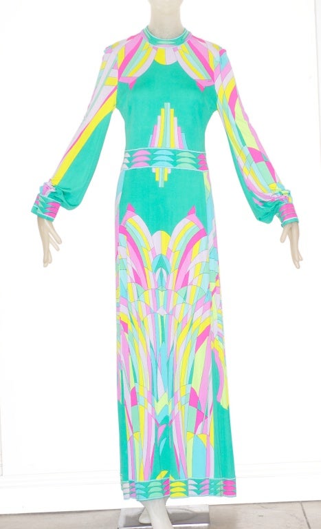 In 1968 Leonard showed their first collection of printed silk jersey dresses and from then on they became known for their bold colorfully printed silk jerseys.

Jetset glamorous this long silk jersey gown is perfect with sun kissed skin and flat