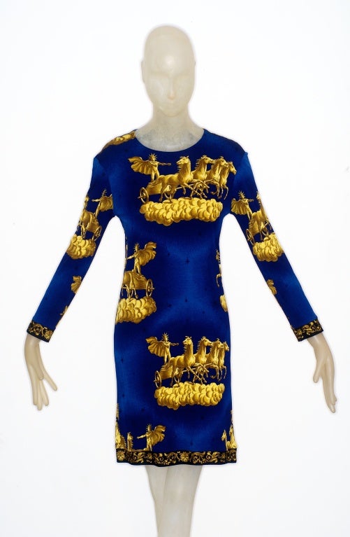 An amazing from Hermes circa 1970s.  On a midnight blue silk in shades of gold Apollo drives his chariot of horses.  Dress is a size large but will fit a contemporary 4/6.  Comes with its original same fabric belt.

RARE vintage
STORE HOURS: