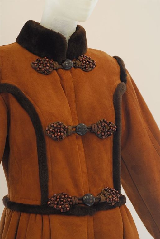 This extraordinary shearling with wood beading is an important part of the Saint Laurent legacy.  The renowned Russian collection was known for its luxurious haute hippie look.

RARE vintage
STORE HOURS: Monday to Friday 11:30 to 6PM
24 West