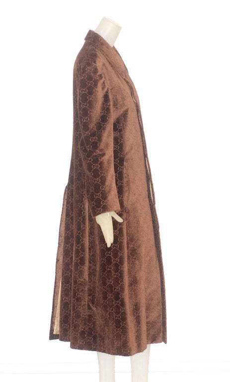 1970s Gucci brown velvet monogram maxi coat.  

Please note the overall condition of the coat is excellent but there are two small faded spots on the front of the coat, it does not detract from the wearability of the coat.

RARE vintage
STORE