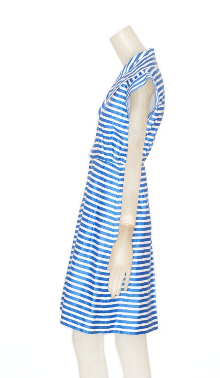 Crisp cotton in blue and white nautical stripes by Yves Saint Laurent rive gauche.
1970s Yves saint Laurent rive gauche blue and white cotton striped dress.  French size 34.