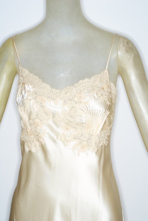 A fine silk negligee with lace and smocked details.