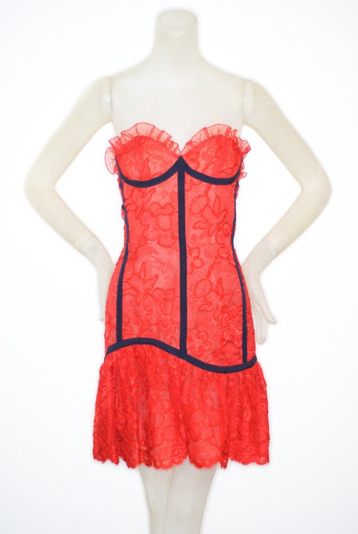 A flirty strapless red lace bustier dress by Yves Saint Laurent.  This dress was in the Spring 1992 runway show.

RARE vintage
STORE HOURS: Monday to Friday 11:30 to 6PM
24 West 57th Street
Fifth floor
in The New York Gallery