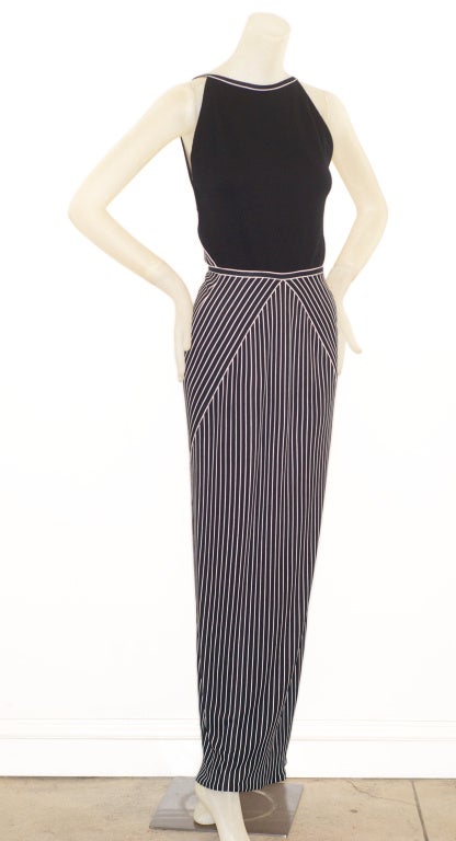 Geoffrey Beene knit jersey black and white striped gown with an open back.

Mr. Beene excelled at taking a masculine fabric and making it have an unexpected appearance in a gown.  He loved geometry but never lost sight of a woman's body.  In this