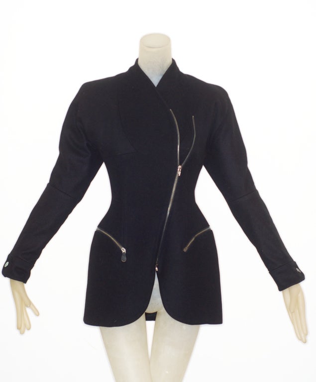 This jacket - a hybrid of a motorcycle jacket and Christian Dior's famous Bar suit - is from the infamous and at the time, widely reviled, Horn of Plenty collection.