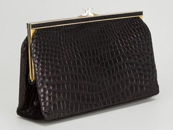 Exceptional Black baby crocodile leather clutch from the French House 