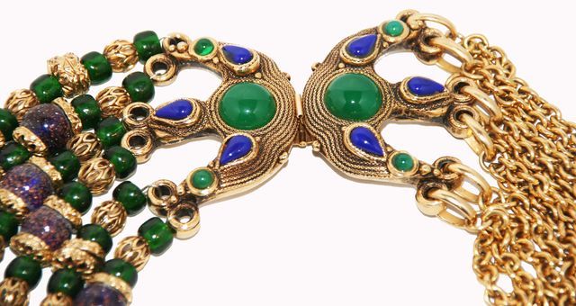Stunning Claire Deve Necklace from the late 80s. Multi-strands of  gold metal chain, emerald gripoix poured glass beads and Lapis 