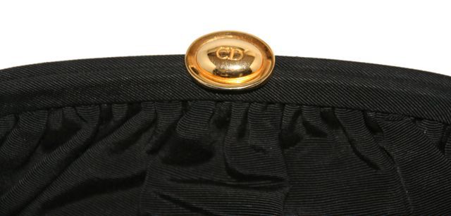 A rare and gorgeous Christian Dior Evening handbag, circa 1990. Gripoix Glass Beads, crystal and gold plated metal. Black silk. Excellent Condition. Size: 25 x 16 x 6 cm.