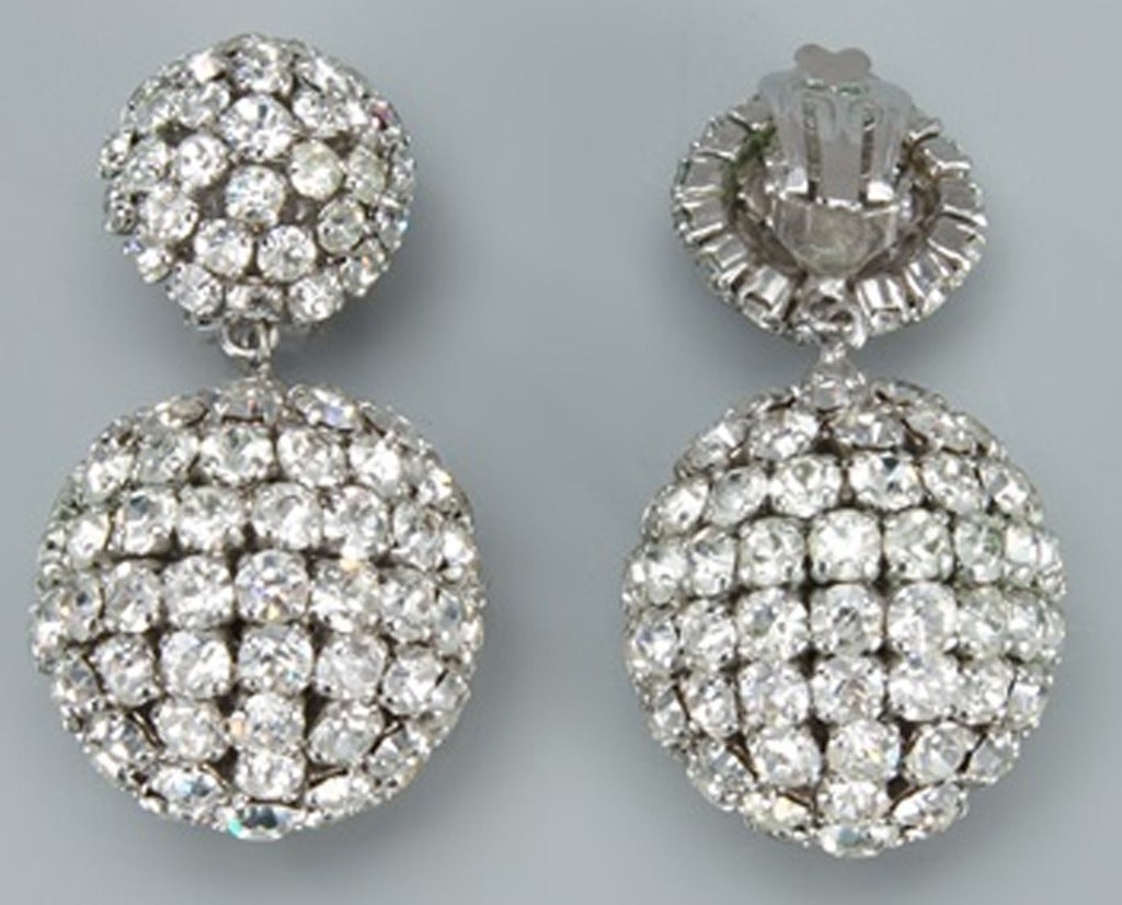 Exceptional and unique Crystal 'Glamour Disco' earrings from Christian Dior featuring a drop design and a rear metal clip fastening. In excellent condition and marked: Chr Dior 1966 Germany. Size: size and fit info: 5.5 x 2.5 cm - 2 1/5 x 1 in.