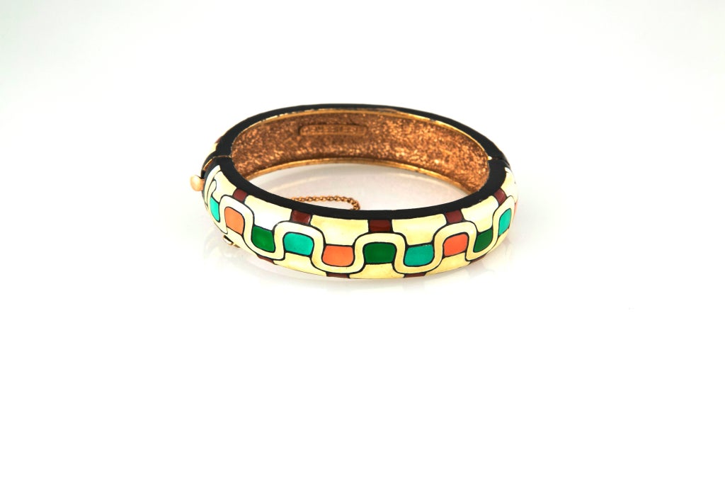 Rare Mid-Century Inspired Eisenberg Enameled Bangle Bracelet.  Rimmed top and bottom in black, this hand enameled bracelet is like nothing we?ve come across.  Eisenberg jewelry was known for innovative designs and quality.  This special bracelet