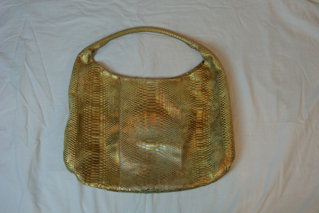 Large light gold handbag.