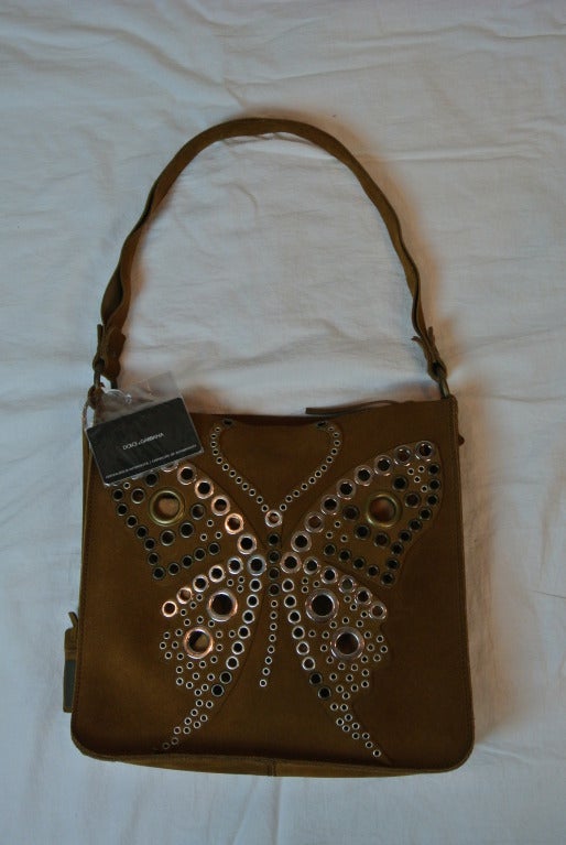 Dolce & Gabana suede handbag with butterfly motif.