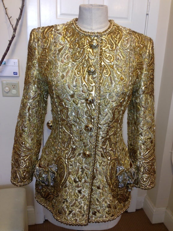 Extremely elegant, over the top evening jacket. Pair it  with black silk palazzo pants and this outfit can't be equaled!

This highly embellished brocade and leather evening jacket uses different lesage techiques, bugle beads, embroidery, and gold