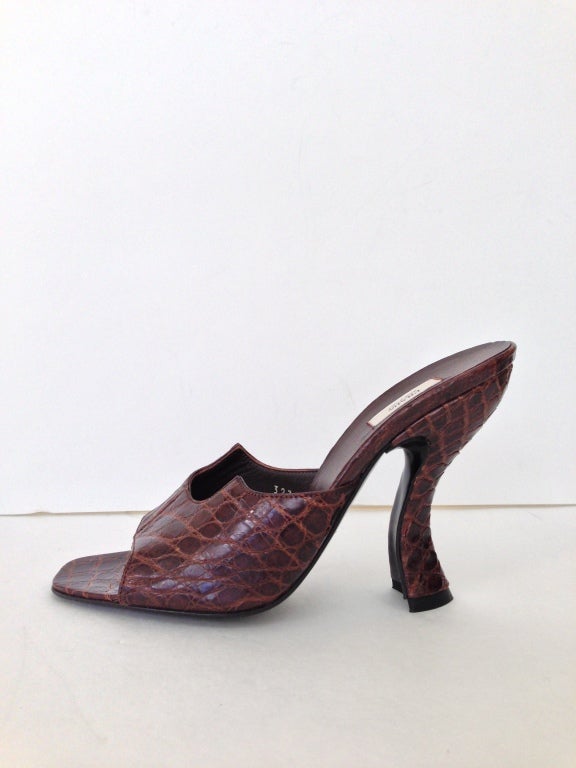 Warm brown croc
Interesting open toe and heel detail
Brand new
All sales are final
Shoe does not come with box

Heel height: 4 inches