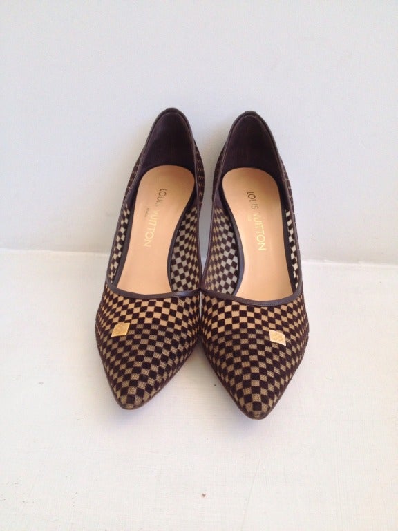 Something to go with your favorite Louis bag!

The distinct fine checkered pattern is made of fine chocolate-colored velvet on nude mesh, making a graphic, airy shoe perfect for the Indian Summer and early Autumn to come.

Deep brown leather